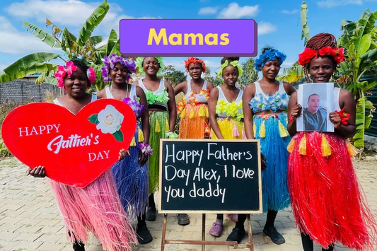 Group of women in colorful dresses with Father's Day messages and a photo of a child.